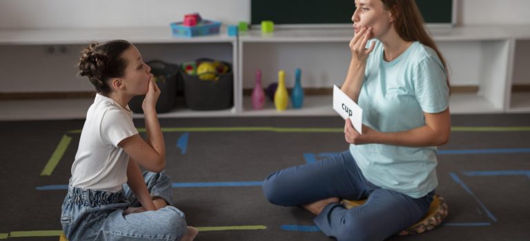 psychologist-helping-girl-speech-therapy